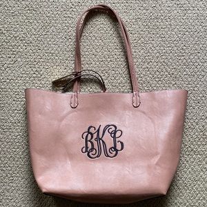 Monogrammed “BLK” faux leather blush handbag